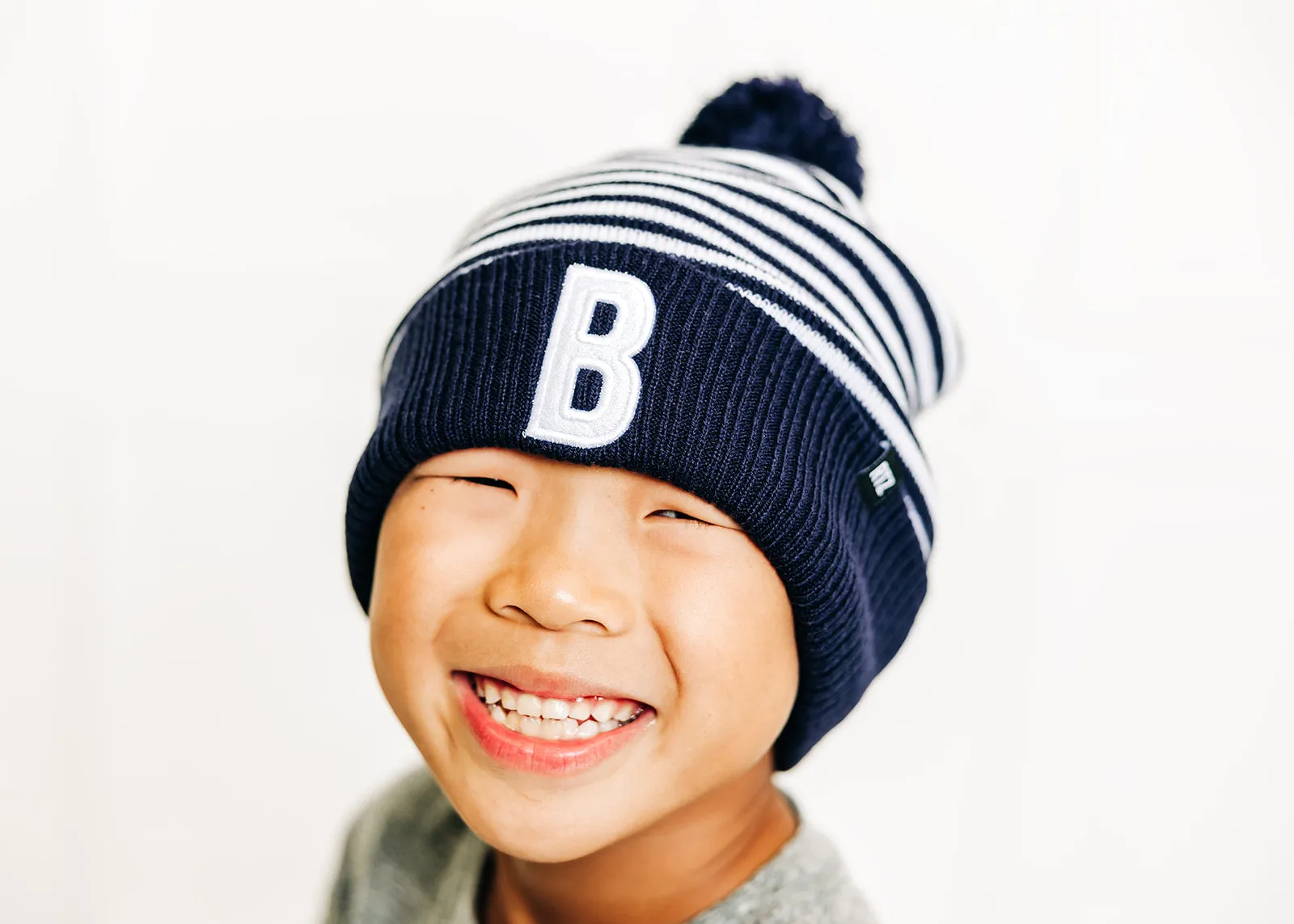 Blue & White Stripe Pom Pom Hat